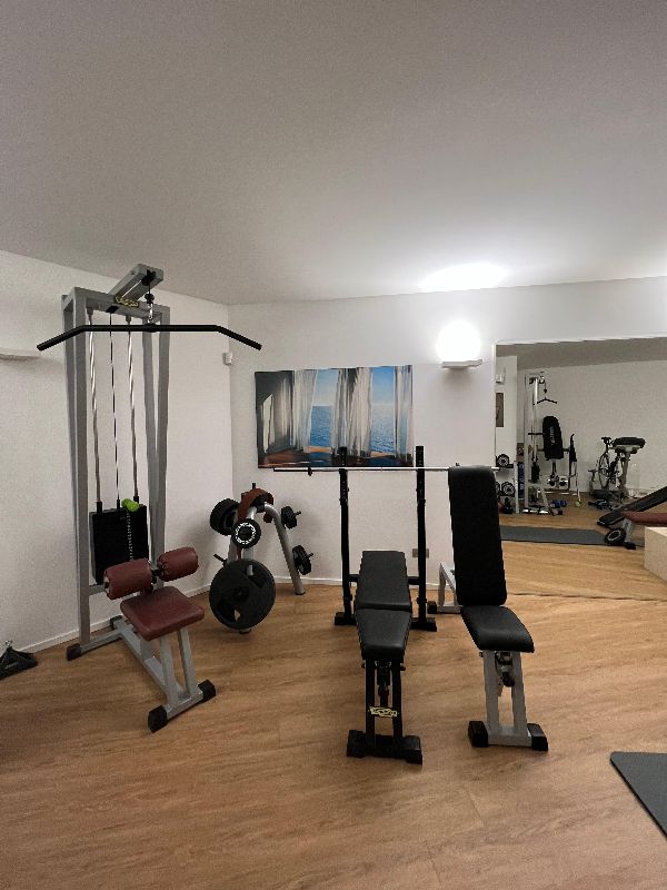 Foto reale di pavimento Vinilico BERRYALLOC SPIRIT in palestra — casa reale della community Casa Match