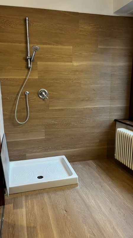 Foto reale di pavimento SPC colore everest FLOW 55 — casa reale della community Casa Match