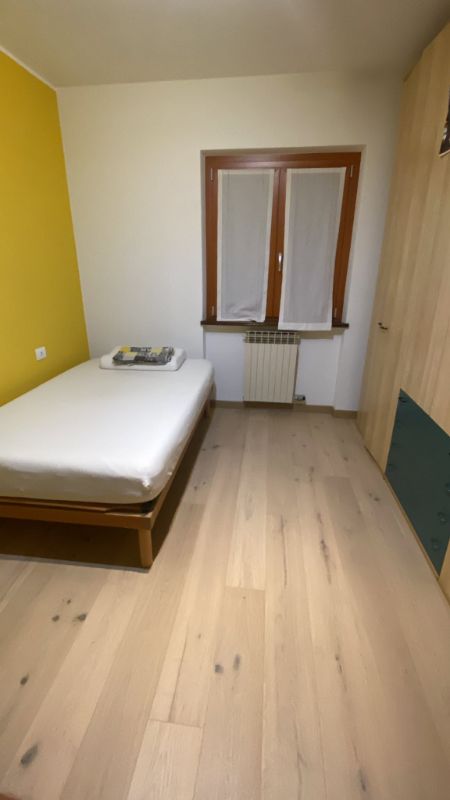 Foto reale di pavimento SPC colore vera con nodi Smartfloors SmartWood — casa reale della community Casa Match